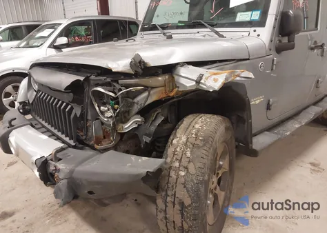 2015 Jeep Wrangler Unlimited Sahara from USA, damaged, VIN 1C4BJWEG0FL629666